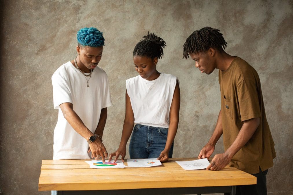 people looking at papers