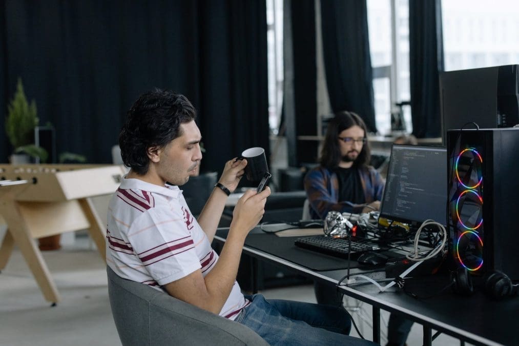 men working with computers