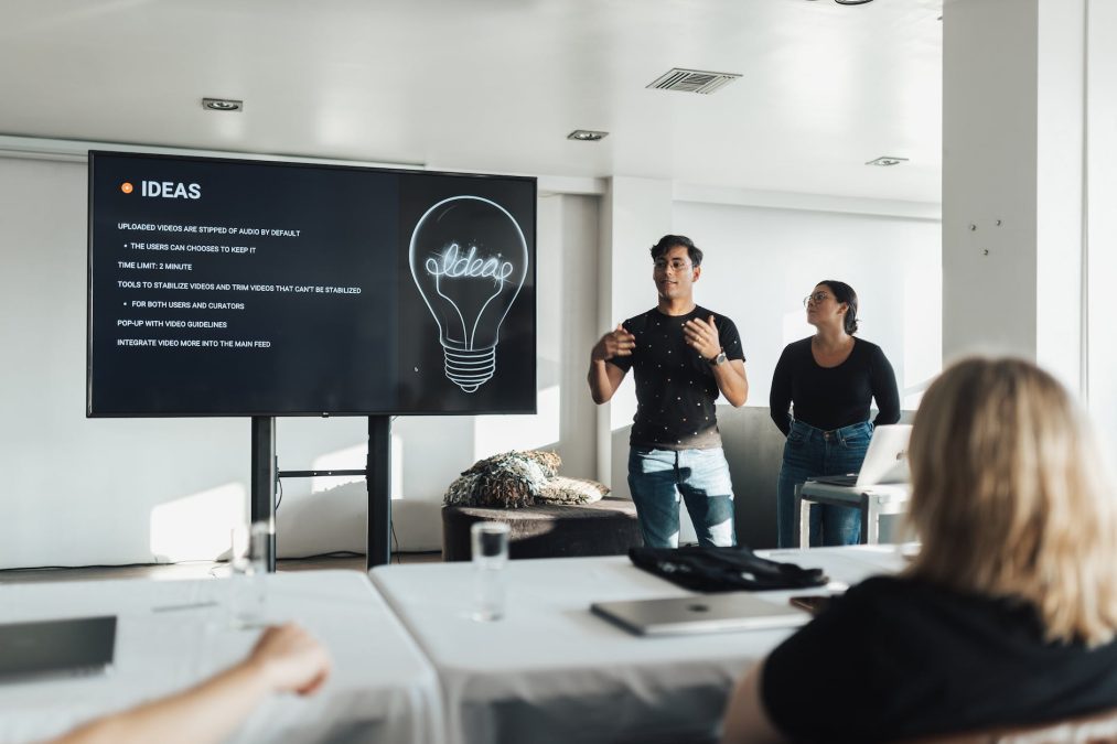 man speaking about ideas in meeting