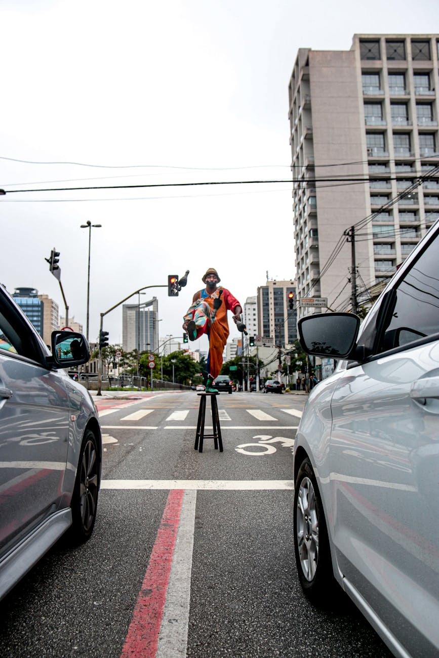 person standing in the middle of the road