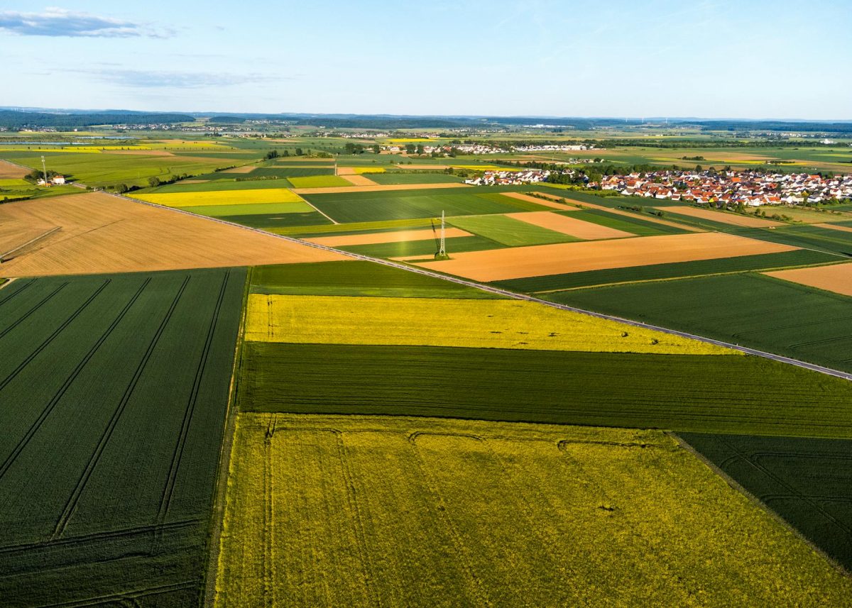 aerial view of colorful patchwork farmland landscape